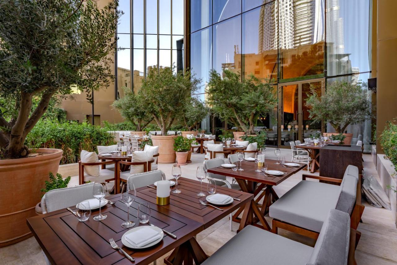 The Dubai Edition Экстерьер фото The patio at the restaurant