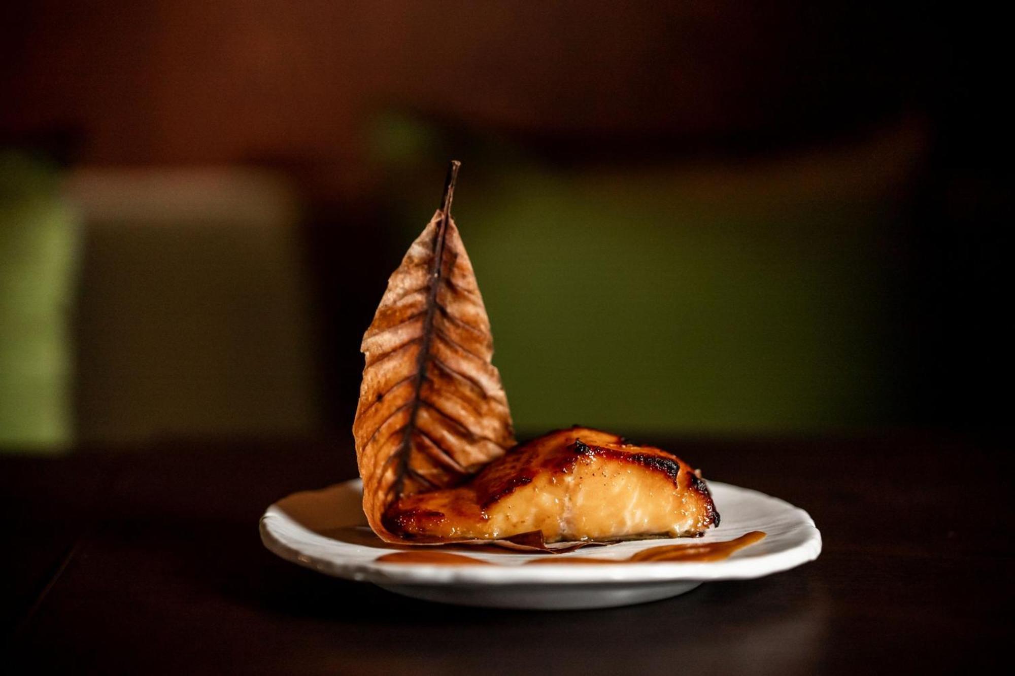 The Dubai Edition Экстерьер фото Smoked and grilled salmon